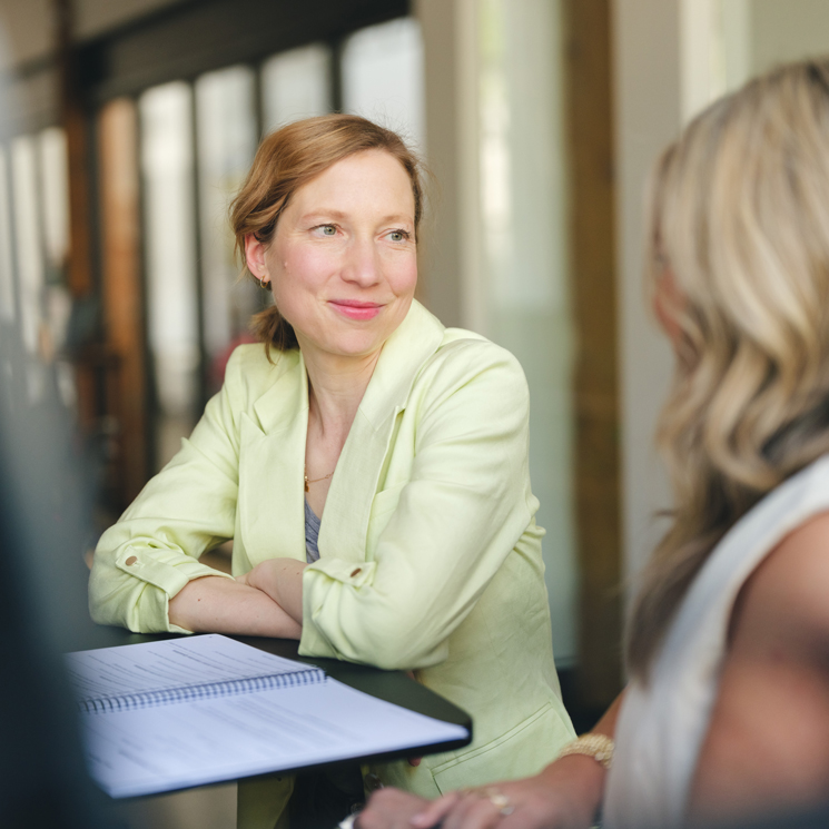 Andrea Bailey consulting with a client