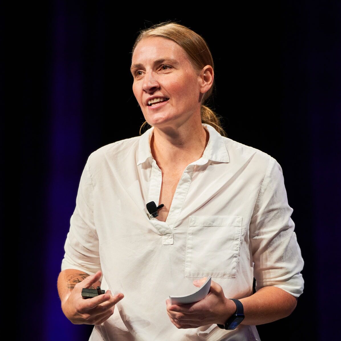 Anja Taylor speaking on stage